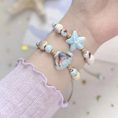 Handmade Shell Starfish Ceramic Beads Bracelet Adjustable Woven Rope Cute Shell Bangle Women Girl Beach Bracelet Holiday Jewelry