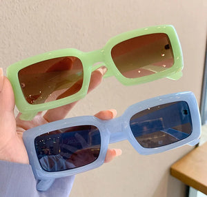 MCROONS Candy Colour sunglasses - green and blue variants, held